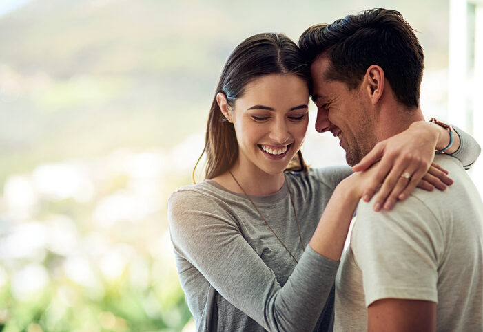 Shot of a happy young couple in a loving embrace